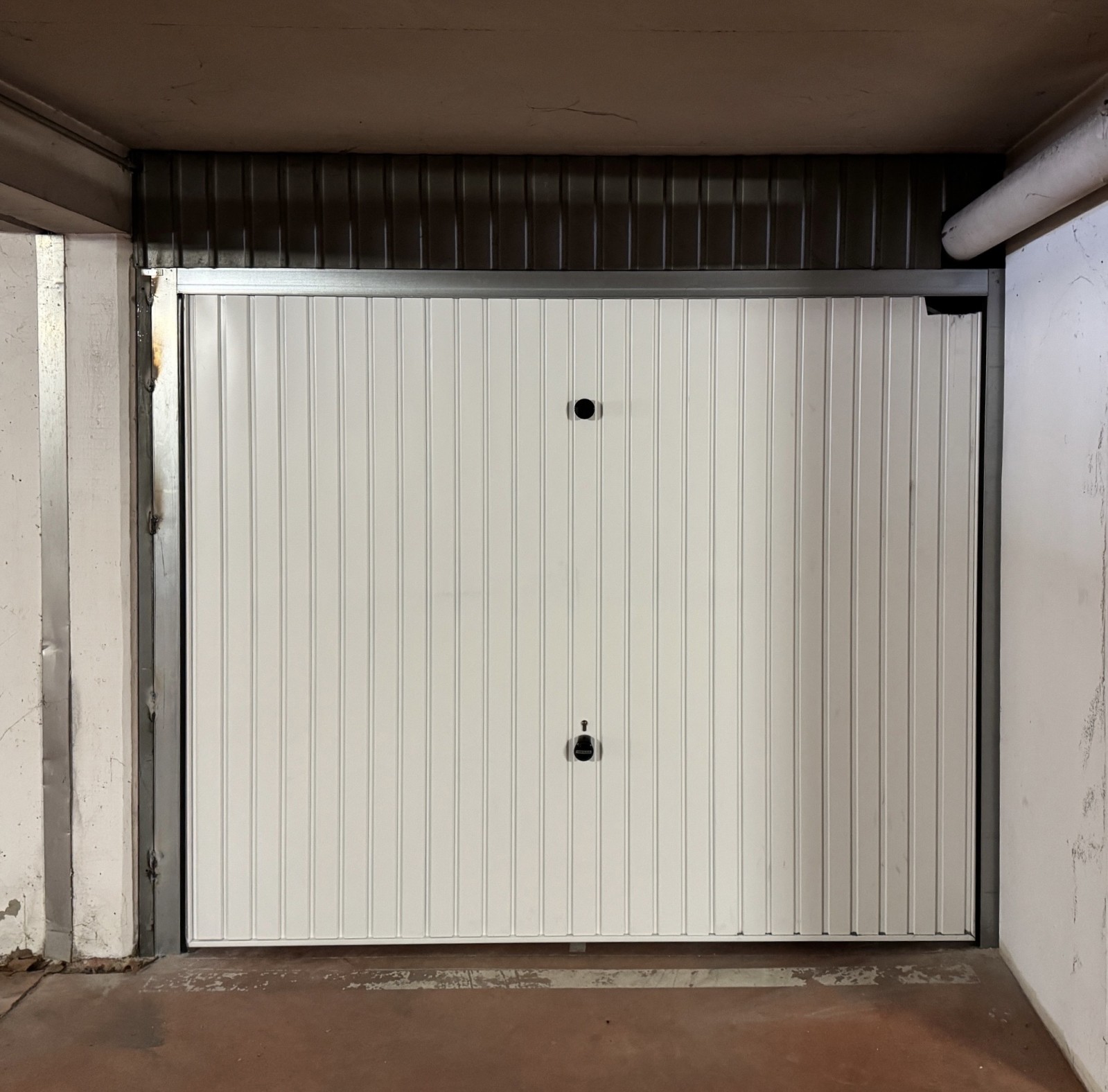 Faire remplacer une porte de garage basculante dans un garage souterrain dans un immeuble en copropriété à Avignon dans le Vaucluse